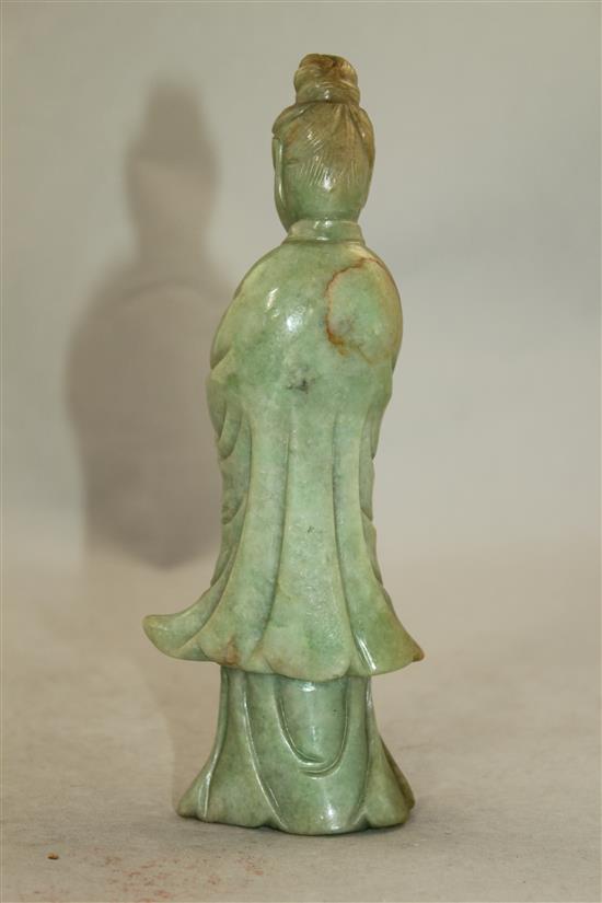 A Chinese jadeite standing figure of Guanyin, early 20th century, MEASUREMENT, wood stand